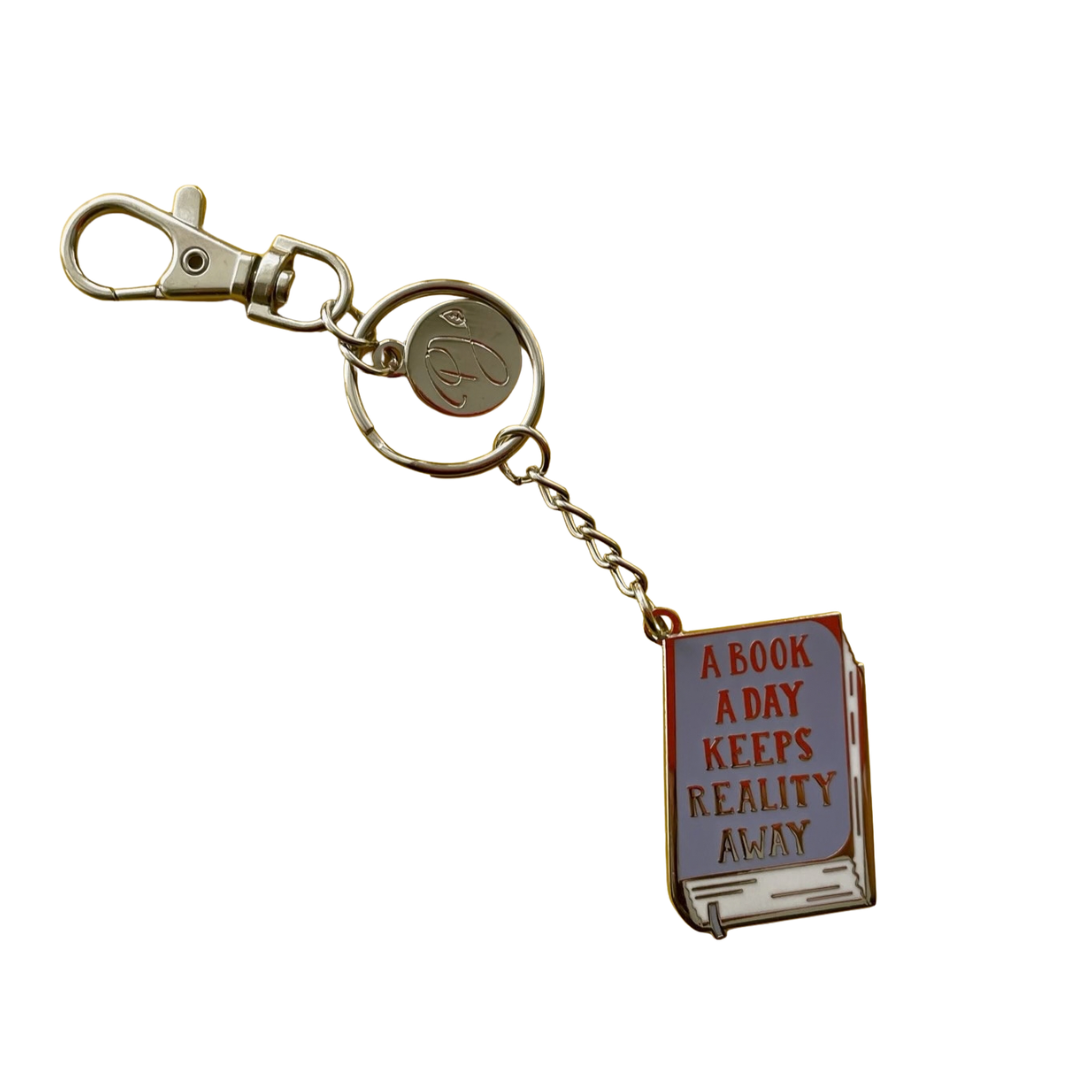 A Book A Day Keeps Reality Away keychain